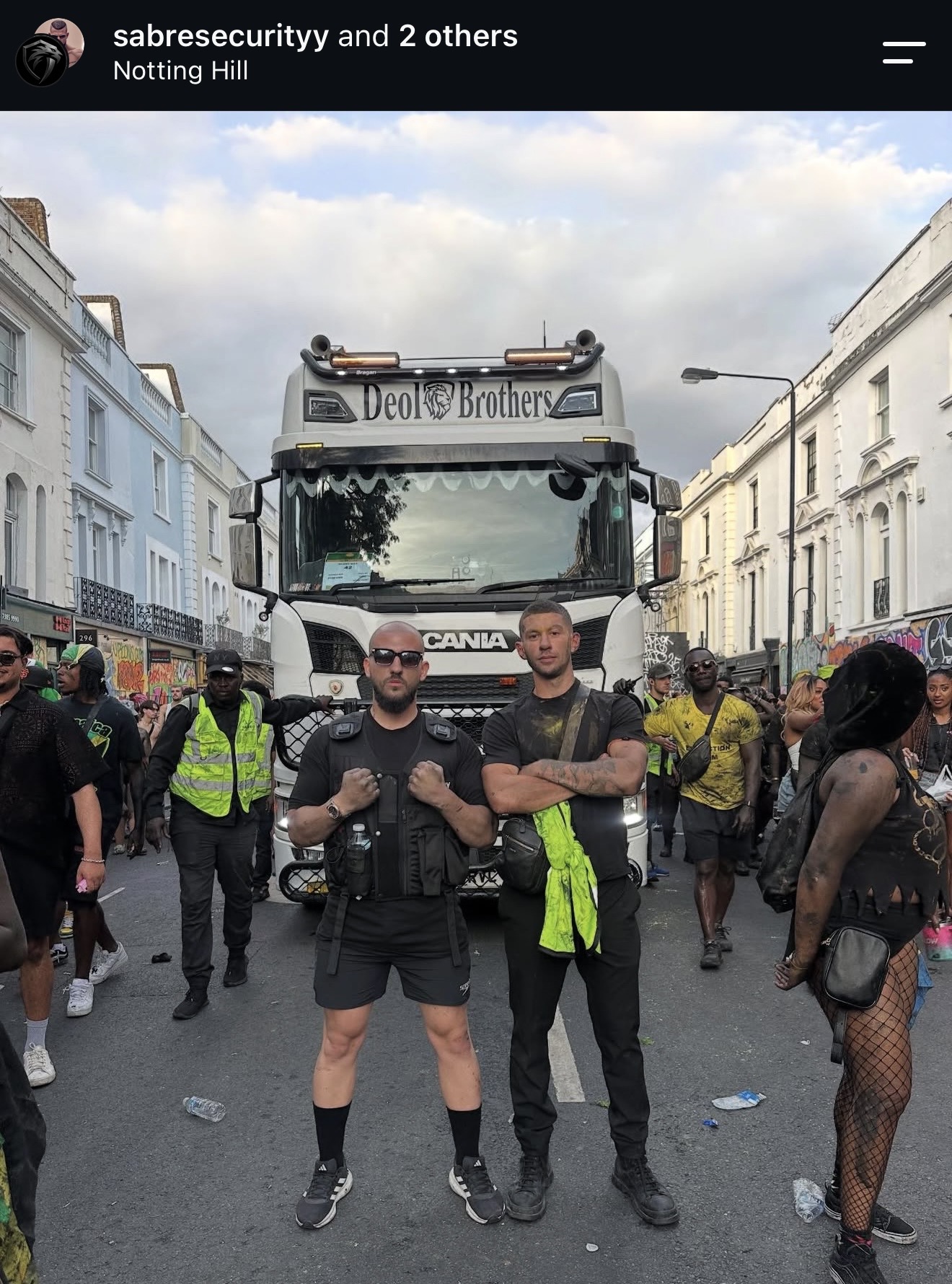 SABRE operatives holding a line at Notting Hill Carnival